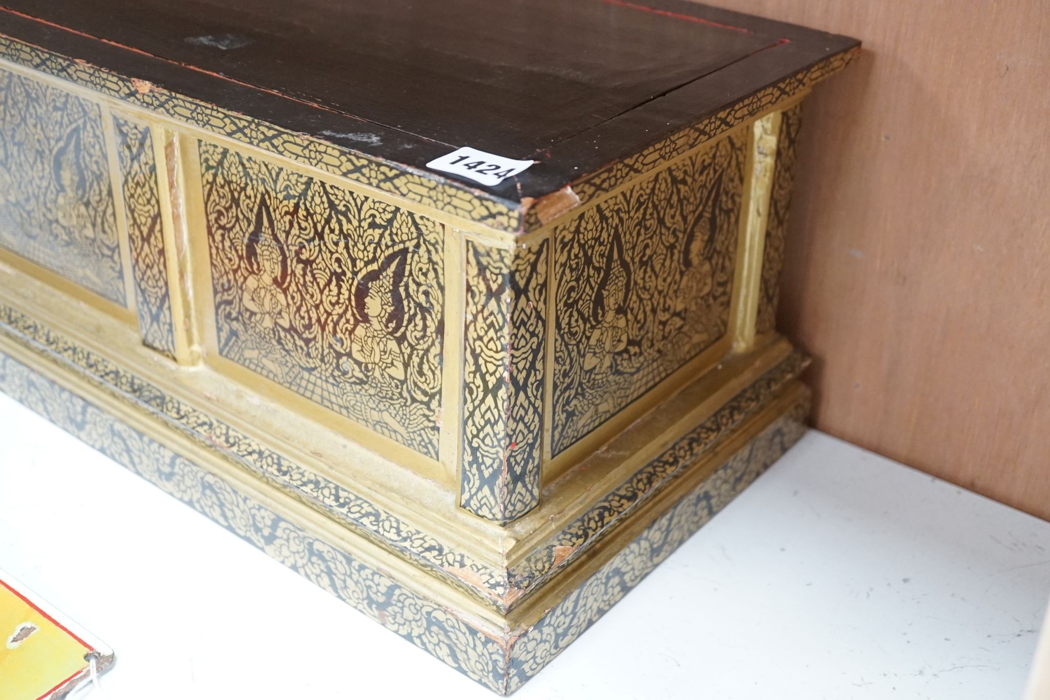 A Thai Buddhist sutra holder, 67 cms wide x 21 cms high.